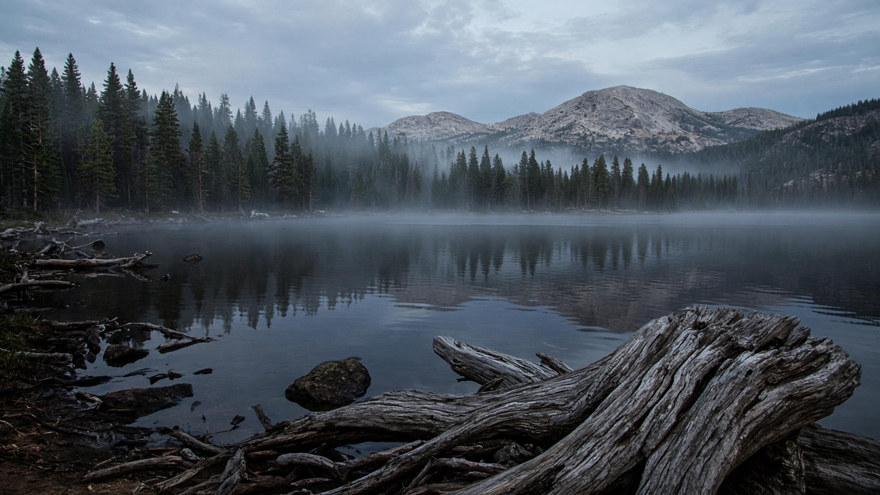 Mist over an Adirondack lake at first light